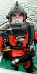 Aqua Lung Public Safety and Military Equipment | Pro Ops | Diver pictured wearing: Apeks Guardian Full Face Mask, Apeks Regulator and Gauge Console, BC1, Rocket II Fins, Whites Hazmat Public Safety Drysuit,...
